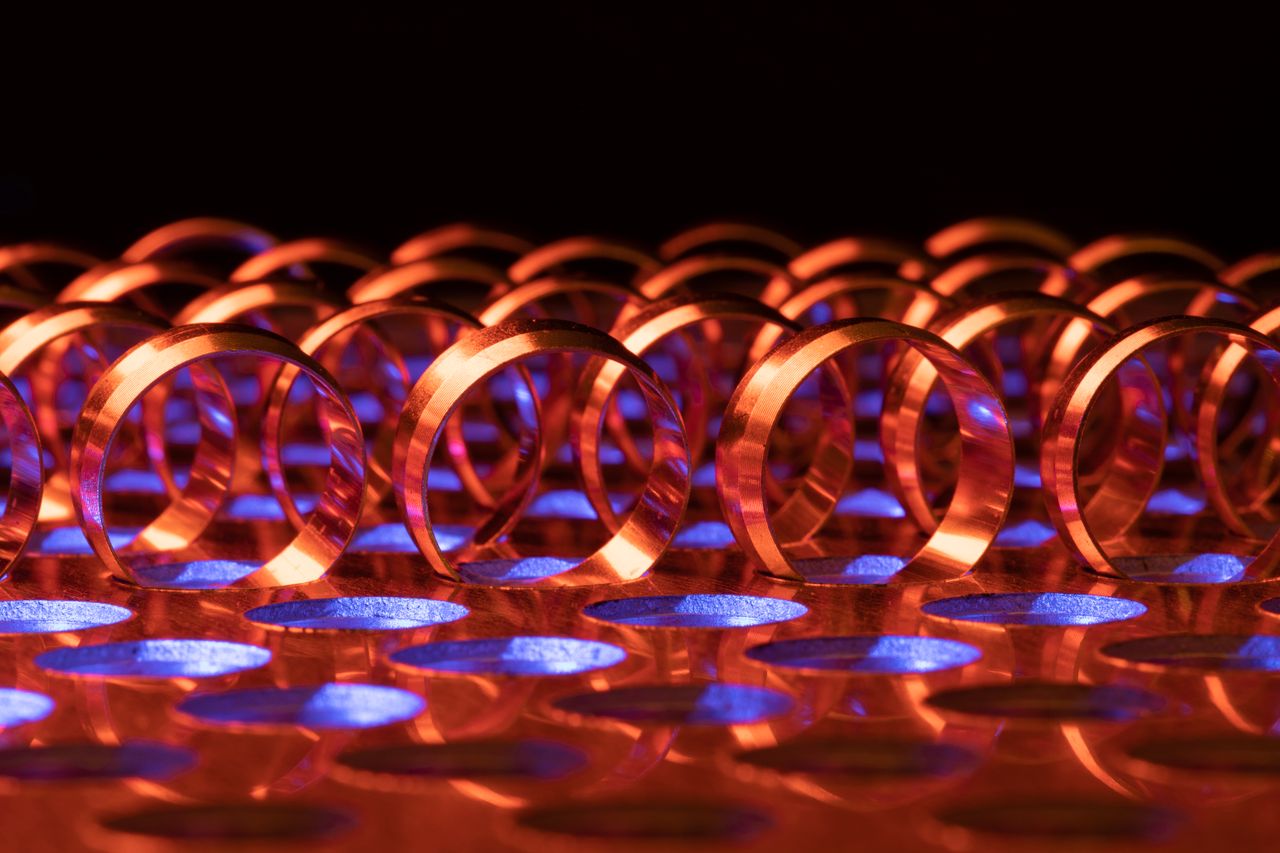 Glowing red metal rings in heat treatment process - Baoya Alloy superalloy manufacturing